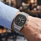 Montre PAGANI DESIGN avec bracelet acier, verre saphir anti-rayures et fonctions chronographe pour un usage quotidien.